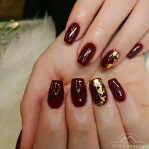 Red Nails with Gold Flakes
